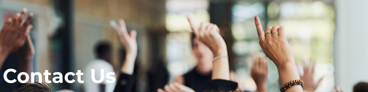 Image of hands up in the air during a presentation